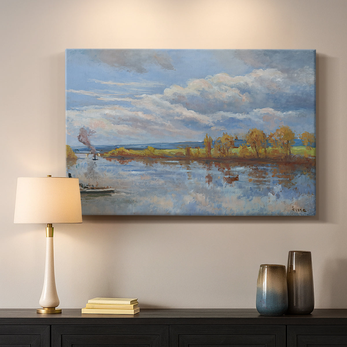 Canvas art print detailing a tranquil composition with riverbank, mounted in a softly lit interior space