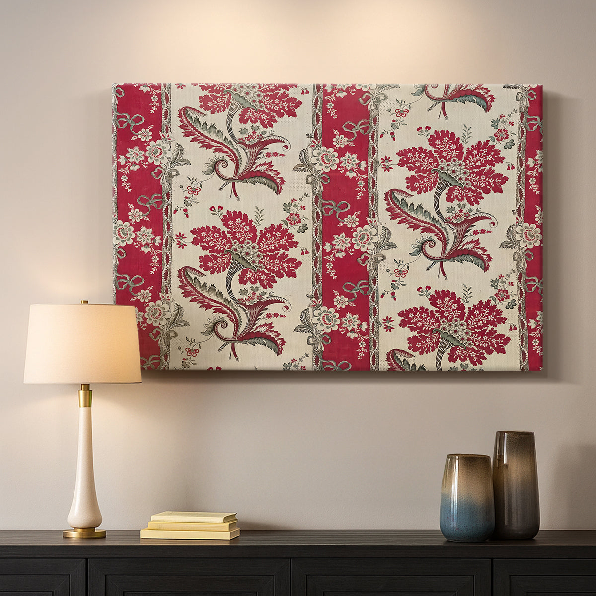 Canvas art print detailing a pattern with floral elements organized around curved central forms, mounted in a softly lit interior space