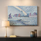 Canvas art print detailing a maritime composition with boats and port architecture, mounted in a softly lit interior space