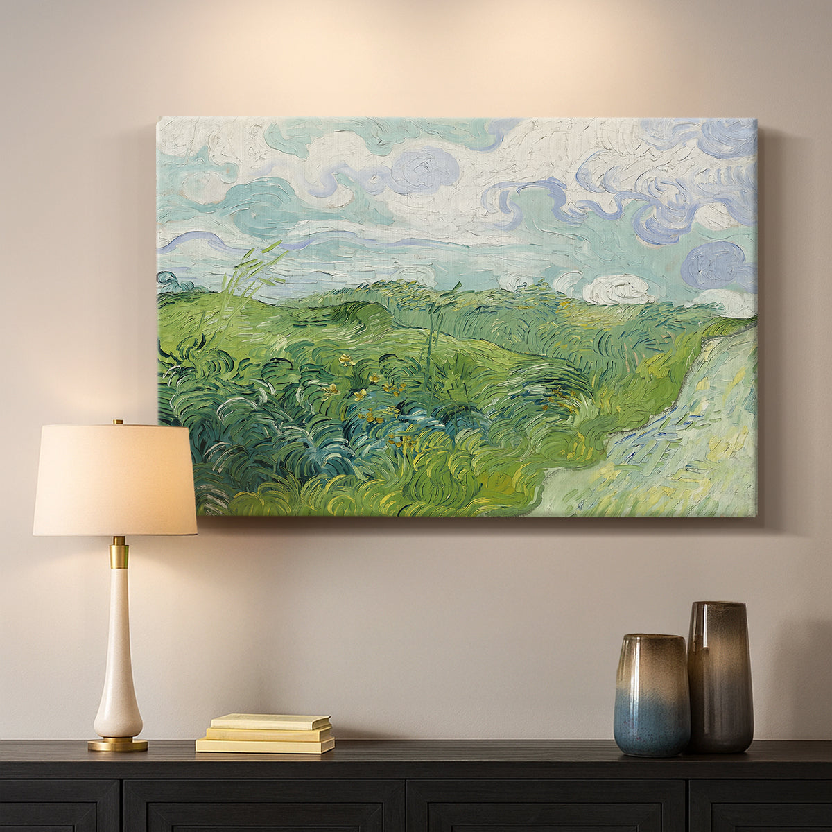 Canvas art print detailing a rural field view with textured brushwork and distant slopes, mounted in a softly lit interior space