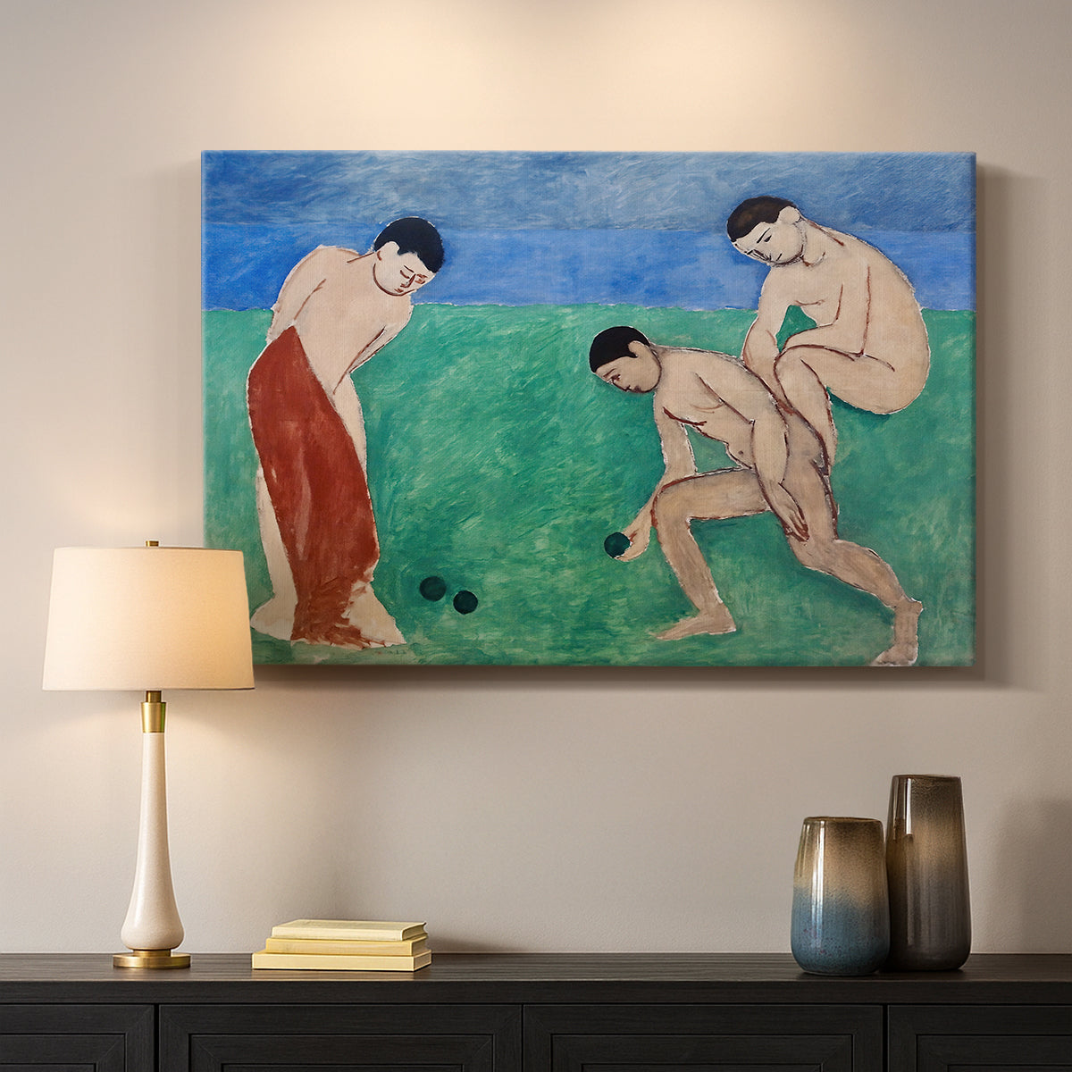Canvas art print detailing a Fauvist composition of bowl players in a landscape, mounted in a softly lit interior space