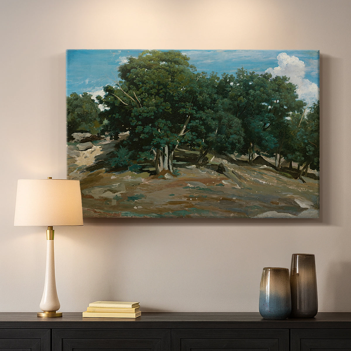 Canvas art print detailing a forest landscape emphasizing trees and space, mounted in a softly lit interior space