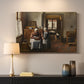 Canvas art print detailing a rustic interior with figures arranged around food, mounted in a softly lit interior space