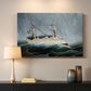 Canvas art print detailing an expressive ocean view with waves and storm clouds, mounted in a softly lit interior space