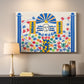 Canvas art print detailing a decorative artwork with geometric motifs and vibrant colors, mounted in a softly lit interior space