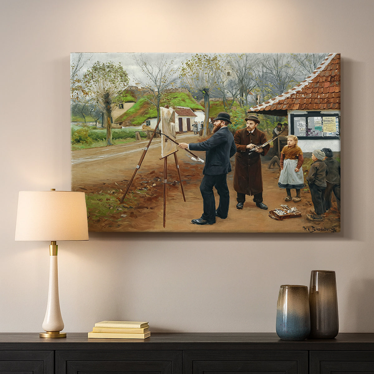 Canvas art print detailing an everyday rural life scene with figures near buildings, mounted in a softly lit interior space