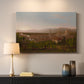 Canvas art print detailing an elevated view combining urban and countryside elements, mounted in a softly lit interior space