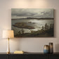 Canvas art print detailing a serene Nordic landscape with fjord and natural light, mounted in a softly lit interior space