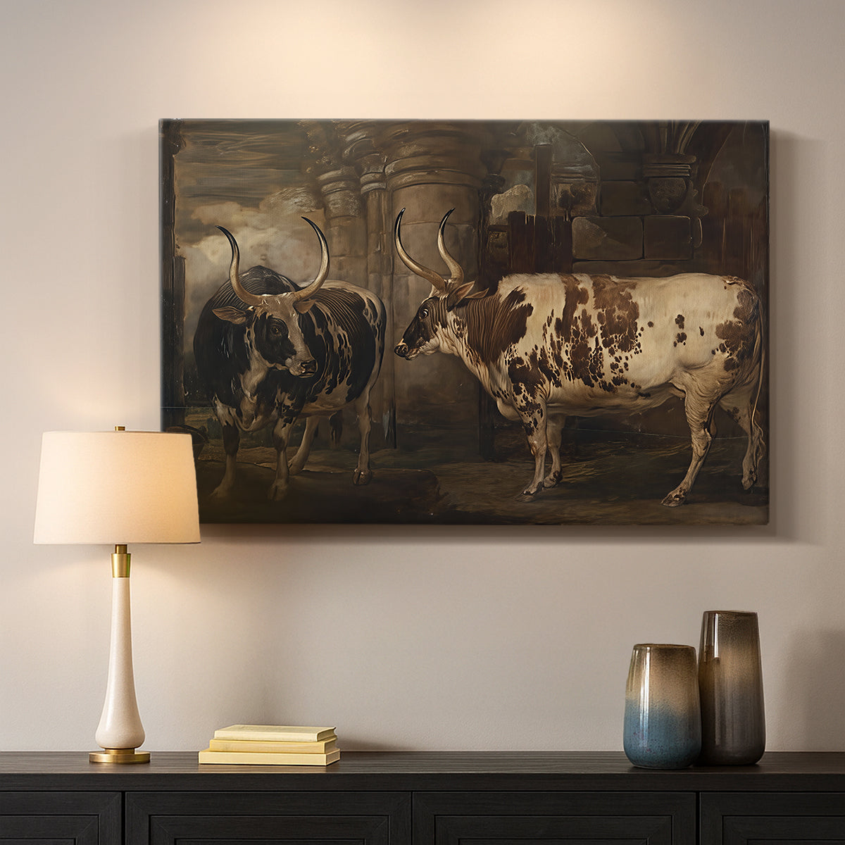 Canvas art print detailing a pastoral scene with two oxen in field, mounted in a softly lit interior space