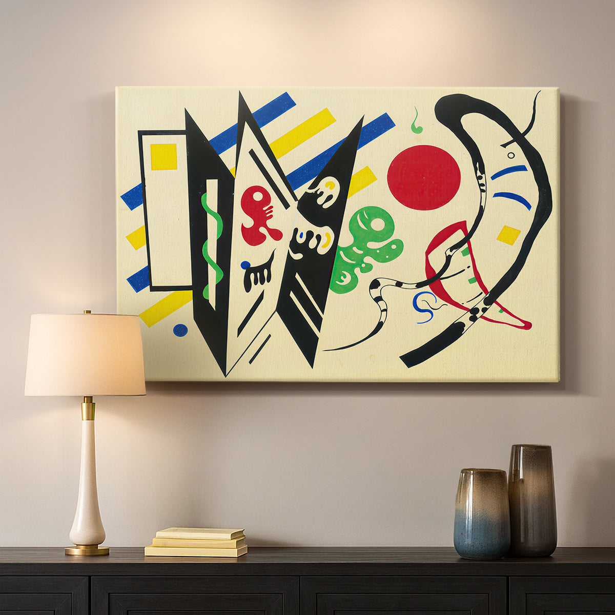 Canvas art print detailing a stylized composition with shapes and directional movement, mounted in a softly lit interior space