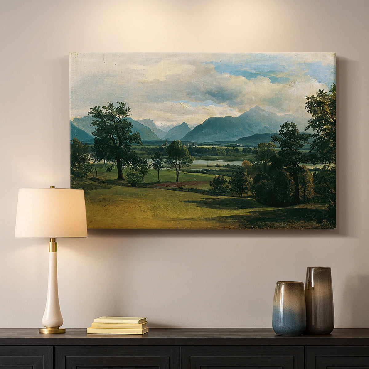Canvas art print detailing a countryside view with soft atmospheric perspective, mounted in a softly lit interior space