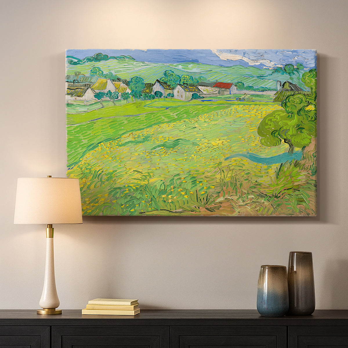 Canvas art print detailing a stylized rural composition with fields and sky, mounted in a softly lit interior space