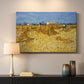 Canvas art print detailing a field composition showing harvest stage with grouped crops, mounted in a softly lit interior space