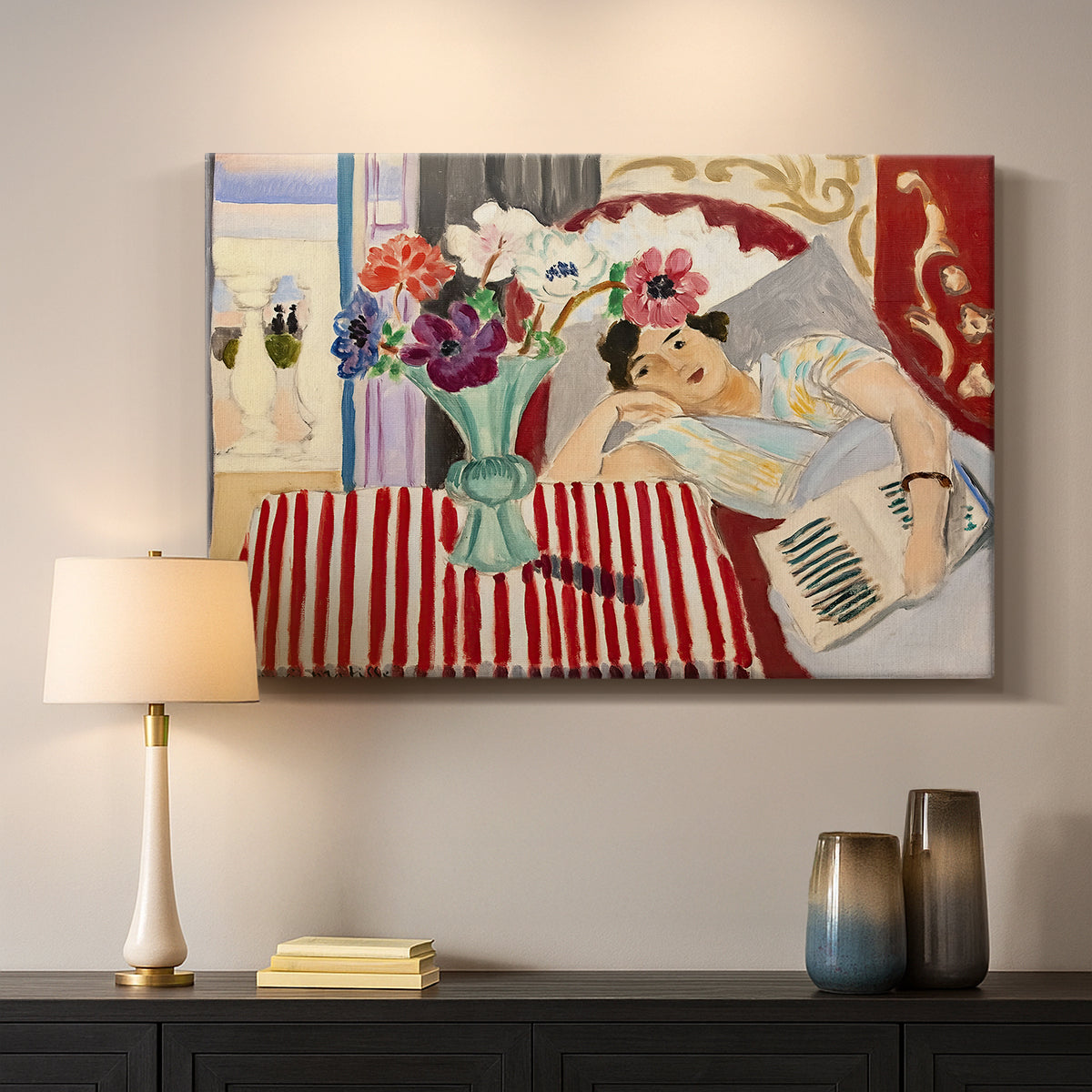 Canvas art print detailing a stylized composition with figure and decorative textiles, mounted in a softly lit interior space