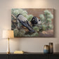 Canvas art print detailing a wildlife painting of dark birds against muted landscape, mounted in a softly lit interior space