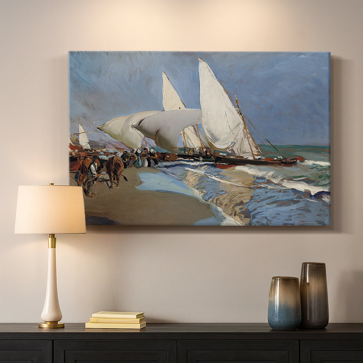 Canvas art print detailing a lively seaside composition with boats and people, mounted in a softly lit interior space