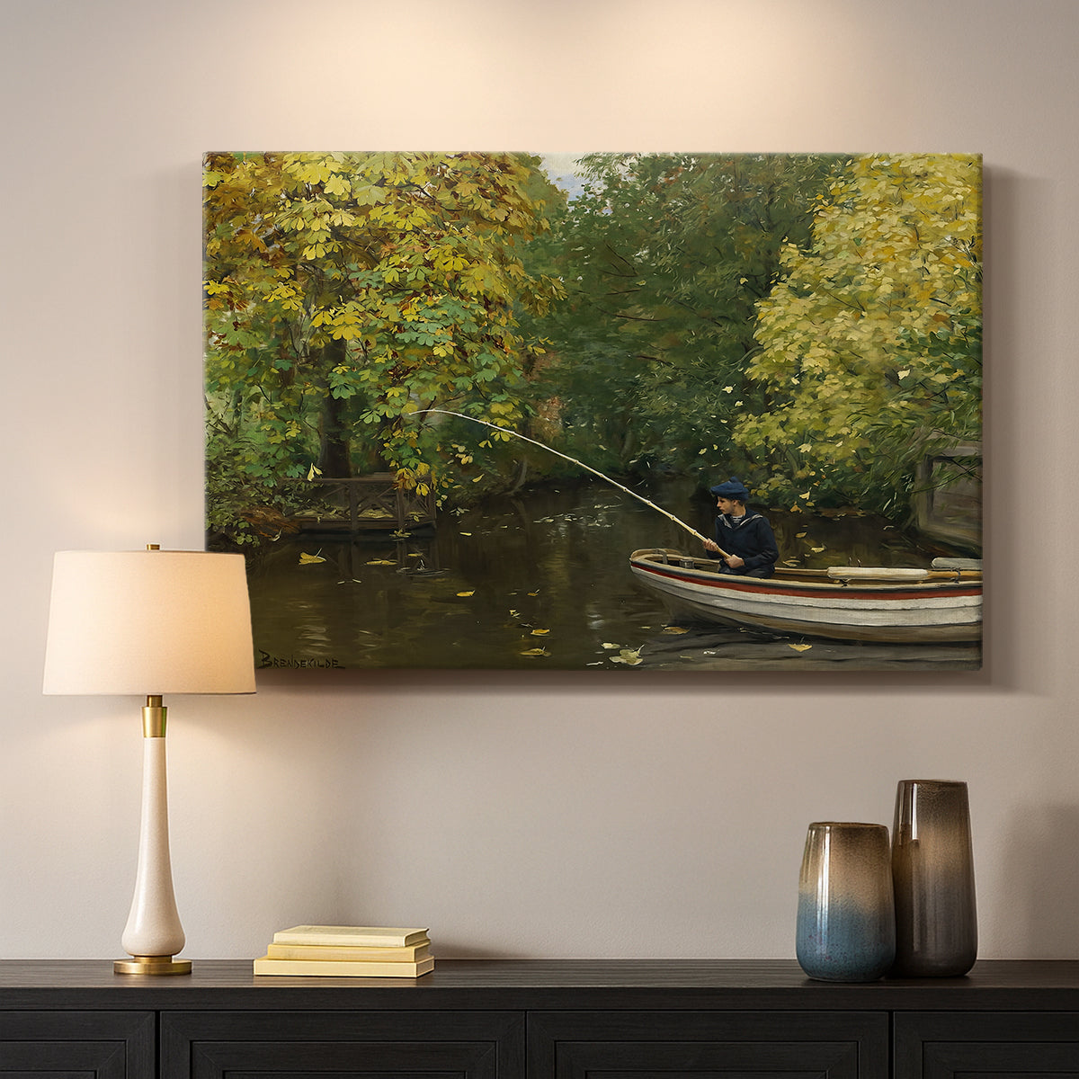 Canvas art print detailing a tranquil nature setting with lone figure by water, mounted in a softly lit interior space