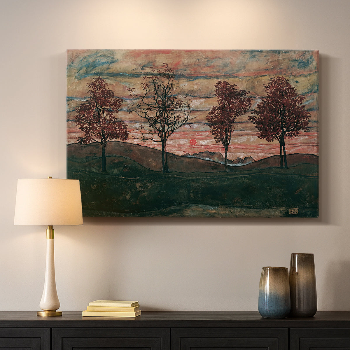 Canvas art print detailing an expressionist landscape featuring isolated trees in field, mounted in a softly lit interior space
