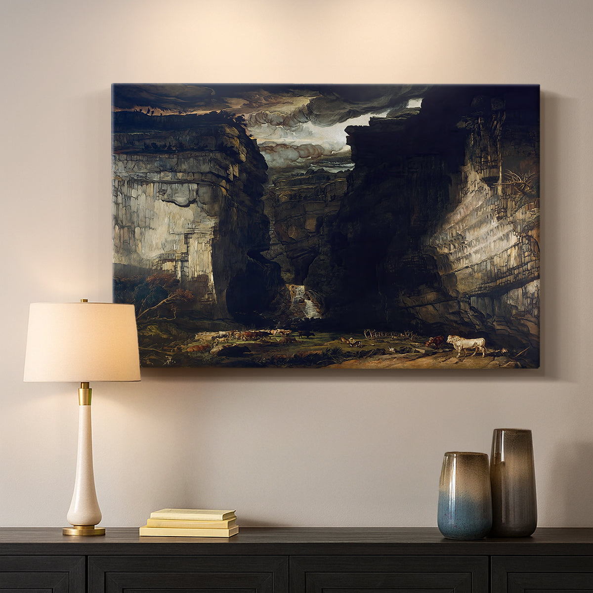 Canvas art print detailing an expansive geological landscape with dramatic elevation, mounted in a softly lit interior space