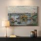 Canvas art print detailing a subdued urban landscape with structure spanning river, mounted in a softly lit interior space