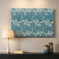 Canvas art print detailing a repeating motif featuring tulips and organic forms, mounted in a softly lit interior space