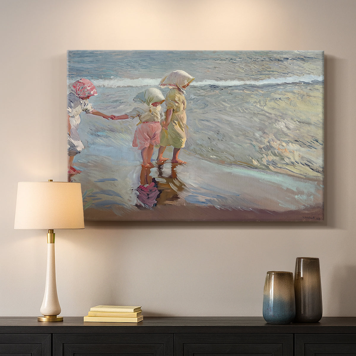 Canvas art print detailing a beach composition with figures and light, mounted in a softly lit interior space