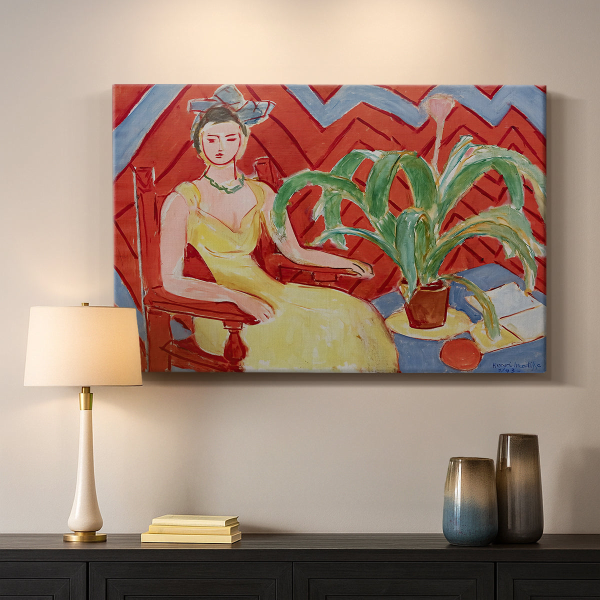 Canvas art print detailing a colorful portrait of a woman in an interior setting, mounted in a softly lit interior space