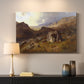 Canvas art print detailing a romantic landscape view with dramatic sky and valley, mounted in a softly lit interior space