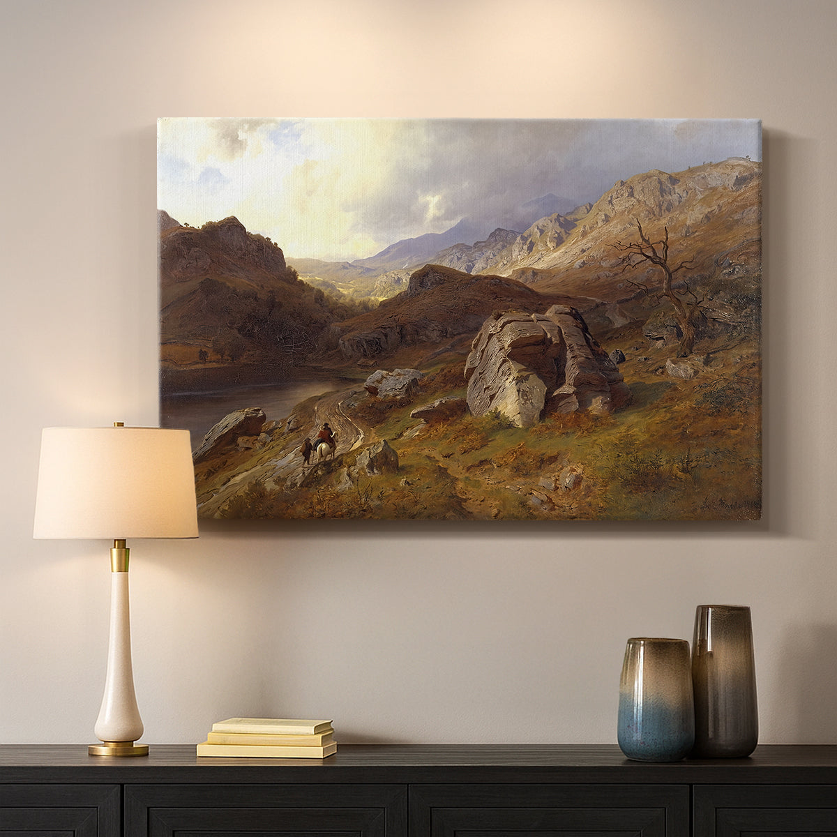 Canvas art print detailing a romantic landscape view with dramatic sky and valley, mounted in a softly lit interior space