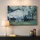 Canvas art print detailing a dramatic depiction of industrial space with trains and light, mounted in a softly lit interior space