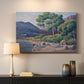 Canvas art print detailing a seaside scene with bathers, mounted in a softly lit interior space