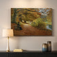 Canvas art print detailing a peaceful autumn setting with figures in wooded environment, mounted in a softly lit interior space