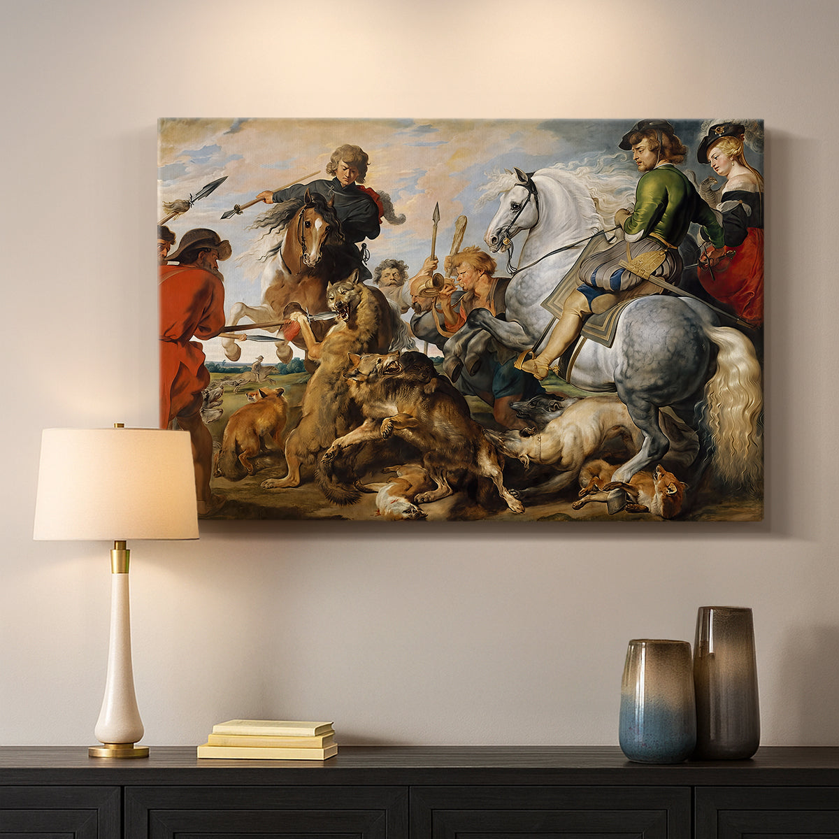 Canvas art print detailing a dramatic outdoor hunt with movement and conflict, mounted in a softly lit interior space