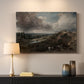 Canvas art print detailing a countryside view emphasizing water and sky, mounted in a softly lit interior space