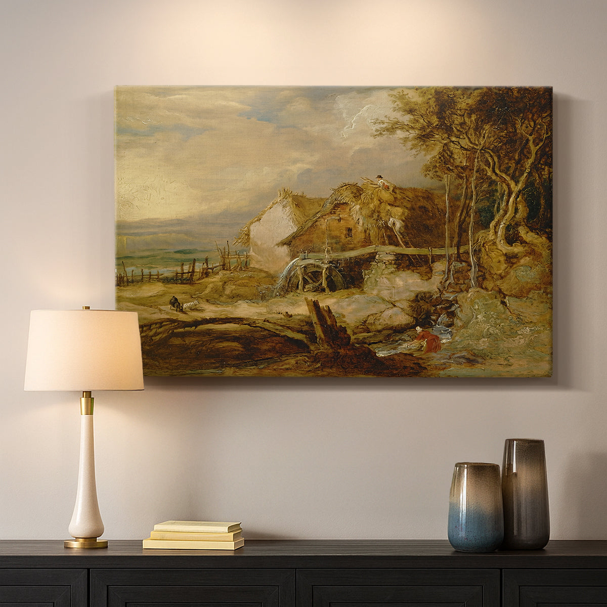 Canvas art print detailing a landscape featuring mill and natural terrain, mounted in a softly lit interior space
