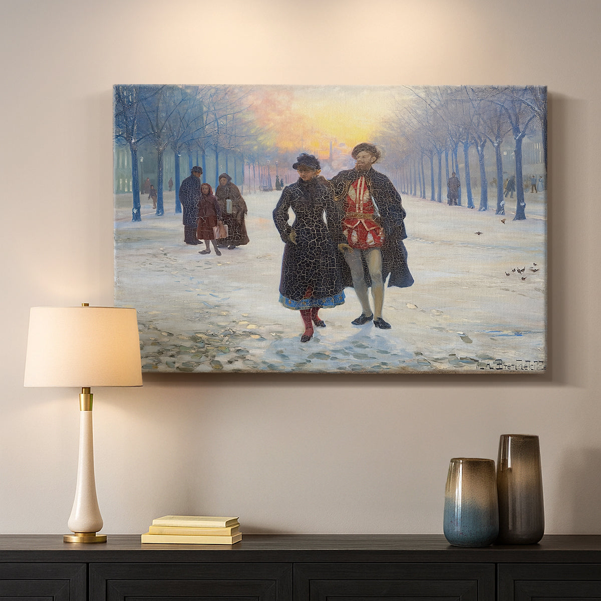 Canvas art print detailing a rural winter landscape with people walking together, mounted in a softly lit interior space
