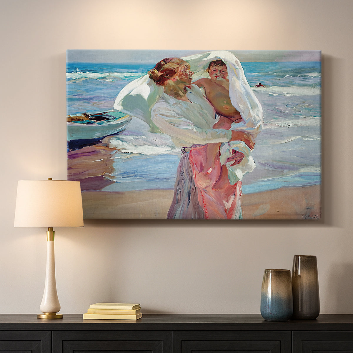 Canvas art print detailing an impressionist beach scene with soft movement and light, mounted in a softly lit interior space