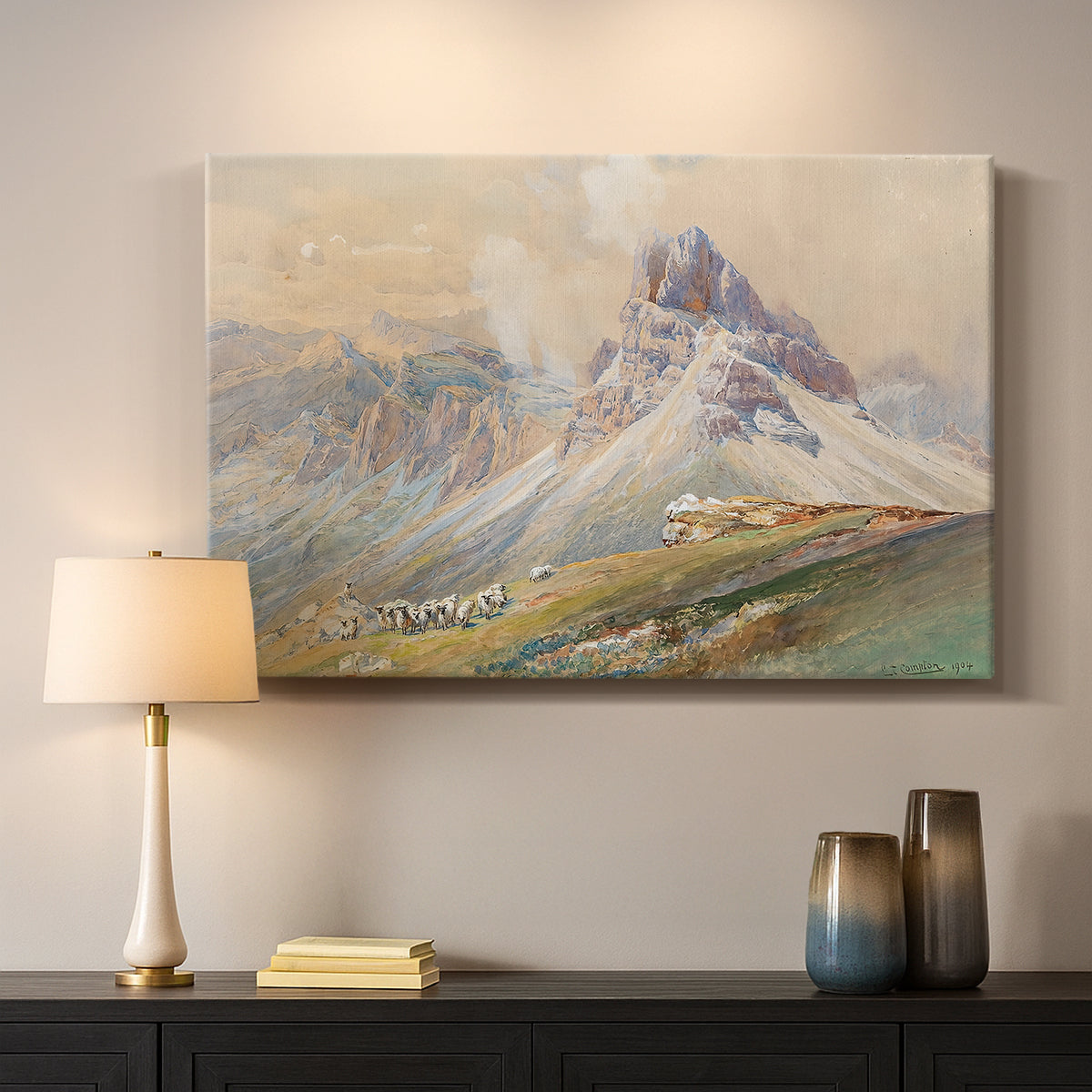Canvas art print detailing a realistic mountain view with strong geological forms, mounted in a softly lit interior space