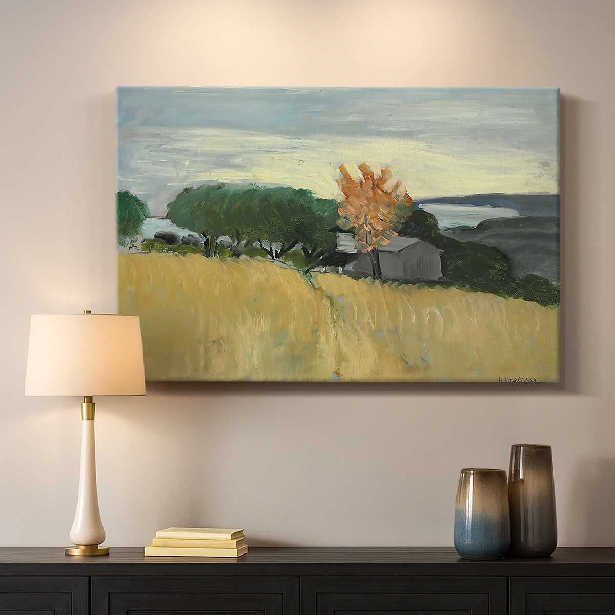Canvas art print detailing a landscape of ripened wheat in an open natural setting, mounted in a softly lit interior space
