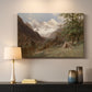 Canvas art print detailing a realistic depiction of remote mountain environment, mounted in a softly lit interior space