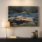 Canvas art print detailing a landscape focusing on waterway and atmospheric depth, mounted in a softly lit interior space