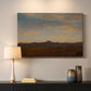 Canvas art print detailing a panoramic natural view with low mountains and open plain, mounted in a softly lit interior space