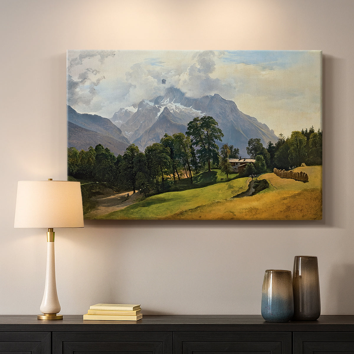 Canvas art print detailing a scenic alpine view with open sky, mounted in a softly lit interior space