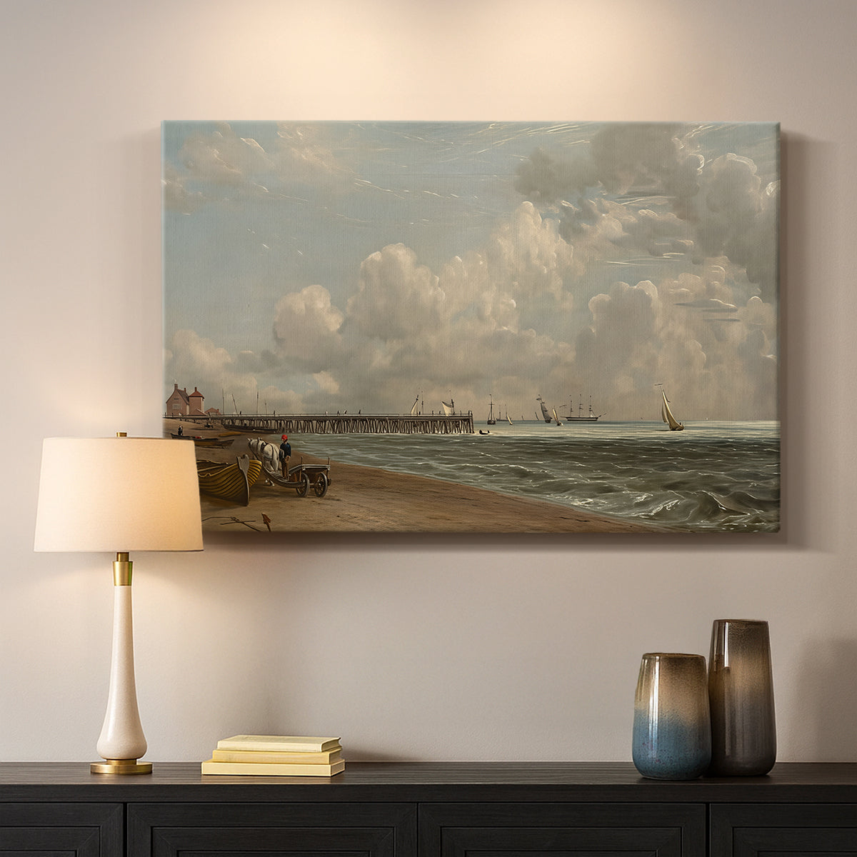Canvas art print detailing a maritime landscape with shoreline, mounted in a softly lit interior space