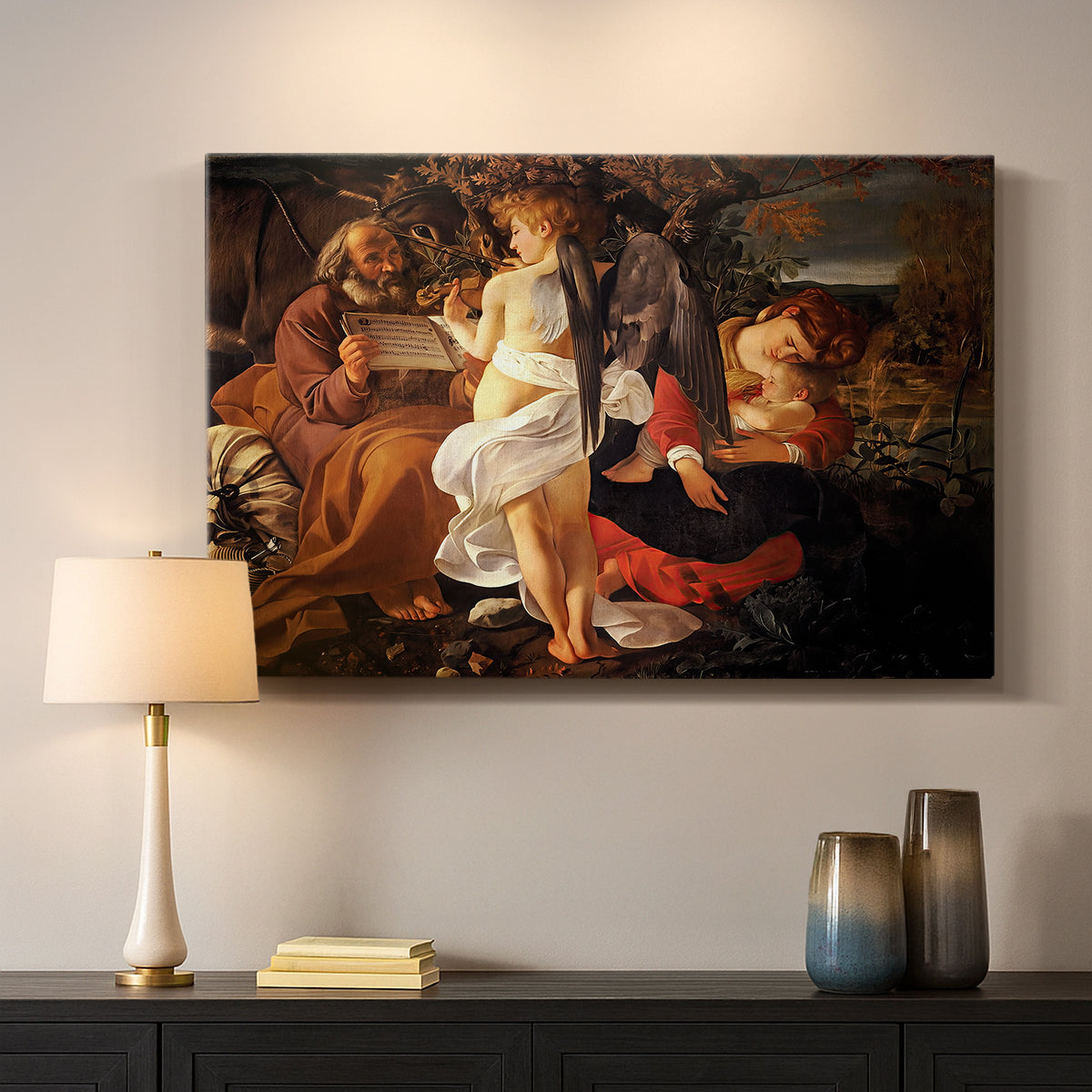 Canvas art print detailing a Baroque landscape with angel playing music for resting travelers, mounted in a softly lit interior space