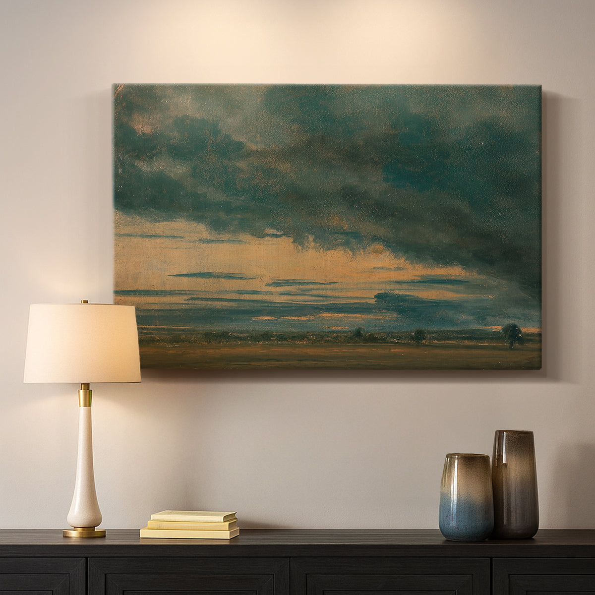 Canvas art print detailing a minimal landscape focusing on clouds, mounted in a softly lit interior space