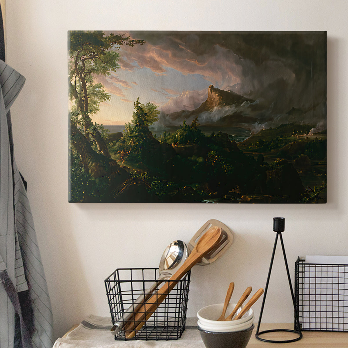 Canvas art print detailing a depiction of nature-dominated world before development, displayed in a softly lit workspace setting