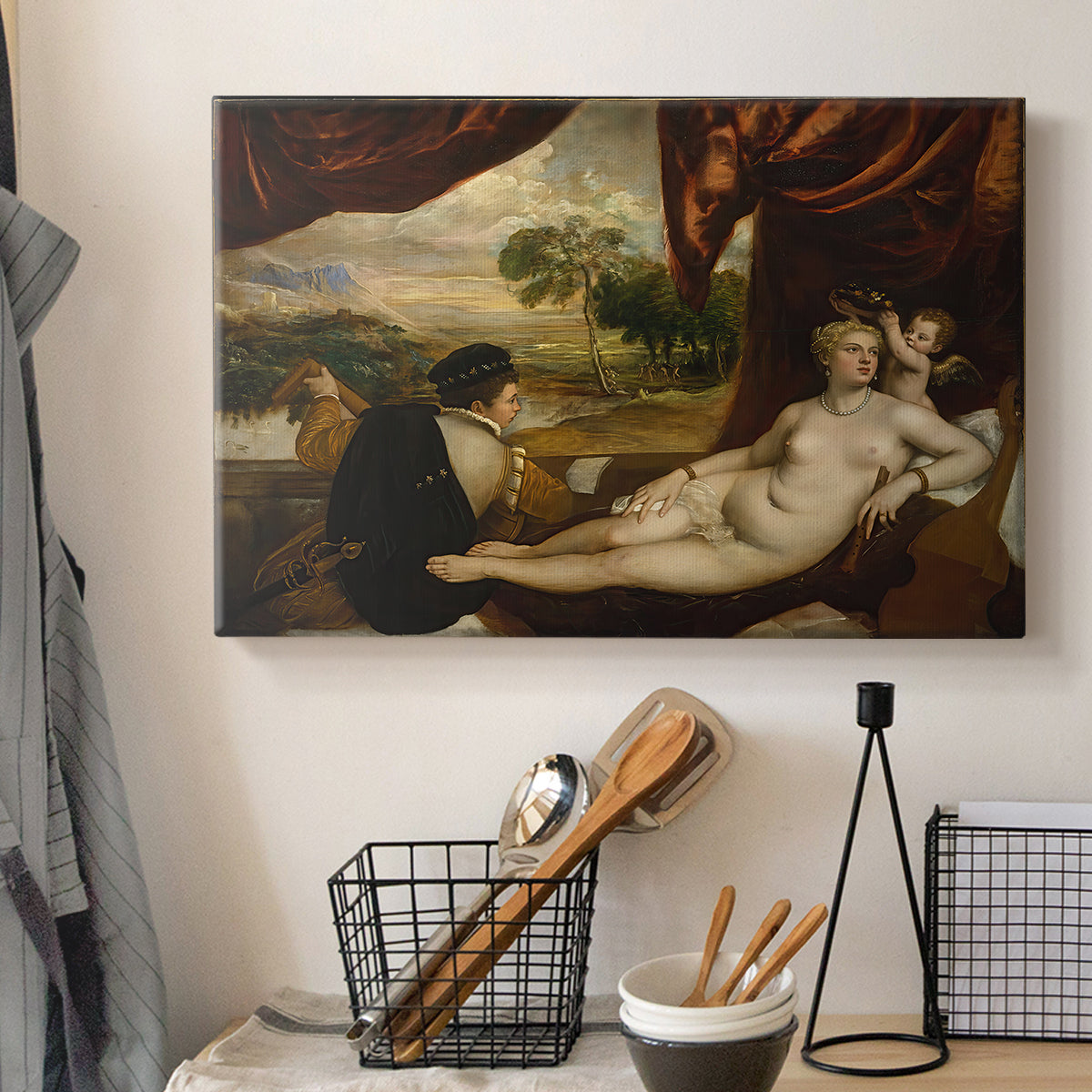 Canvas art print detailing a classical scene combining reclining Venus and musical companion, displayed in a softly lit workspace setting