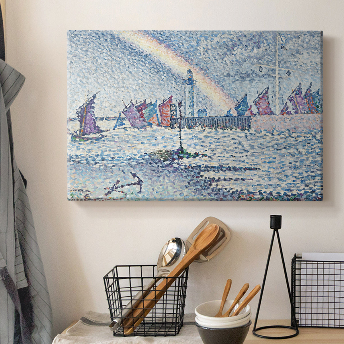 Canvas art print detailing a maritime composition with boats and port architecture, displayed in a softly lit workspace setting