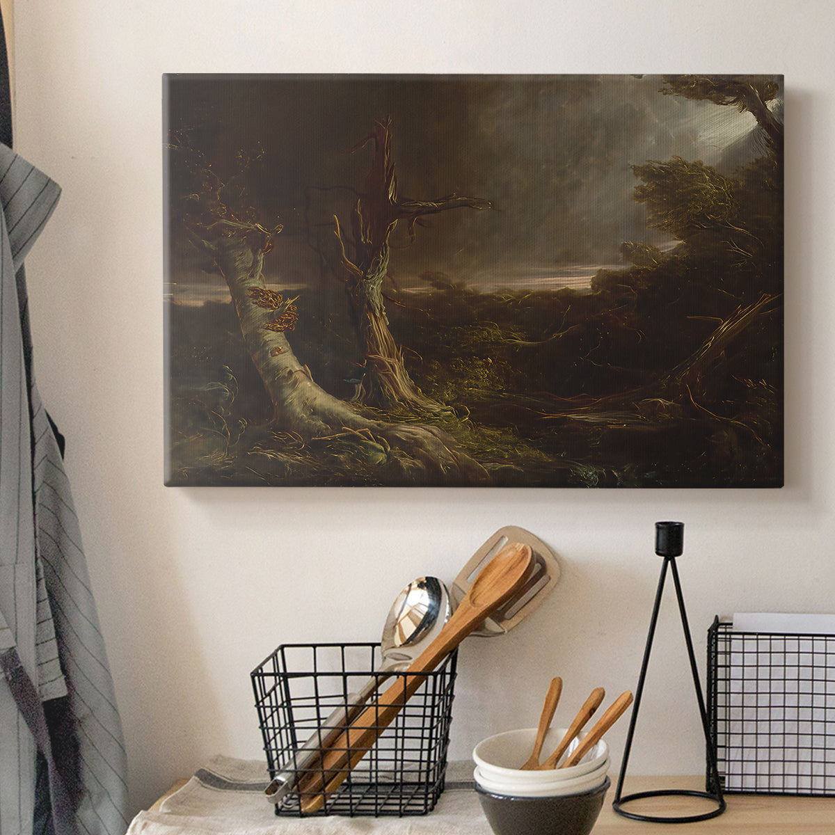 Canvas art print detailing a landscape emphasizing motion and storm intensity, displayed in a softly lit workspace setting